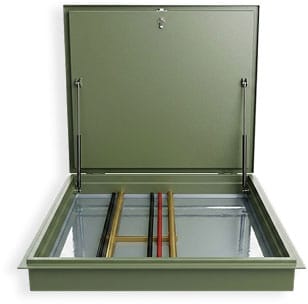 Floor hatch steel door propped open, showing the recessed frame